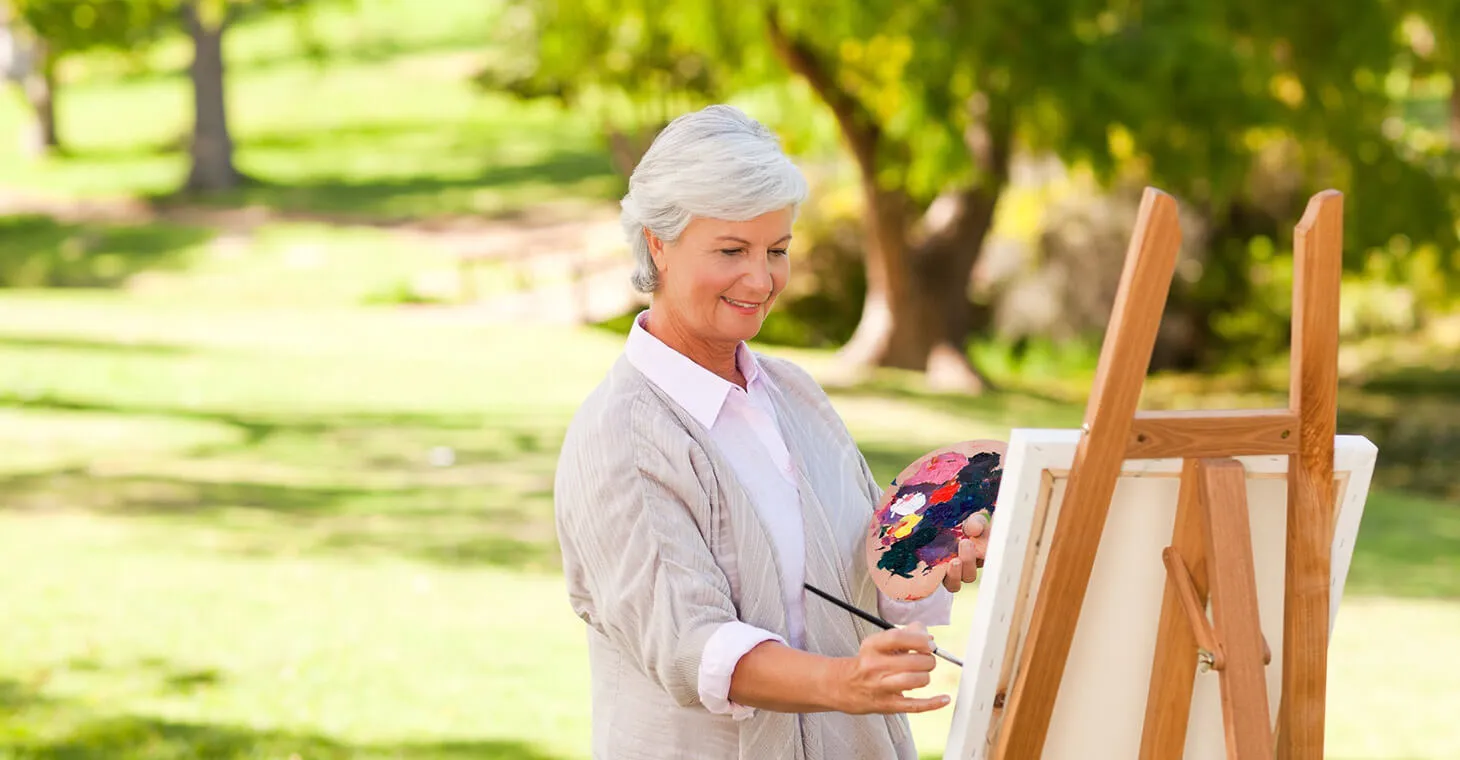 Woman painting outside in Wisconsin