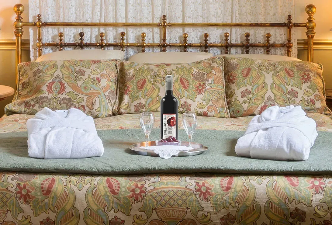 Cedar Creek Wine on a bed