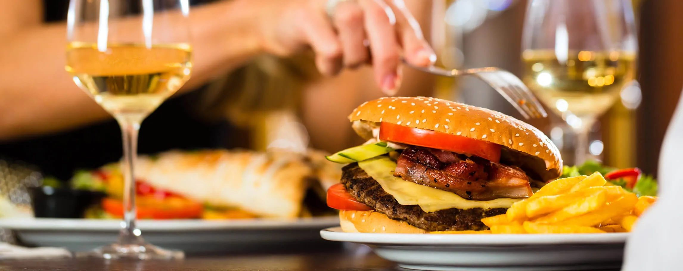 Gourmet hamburger with white wine