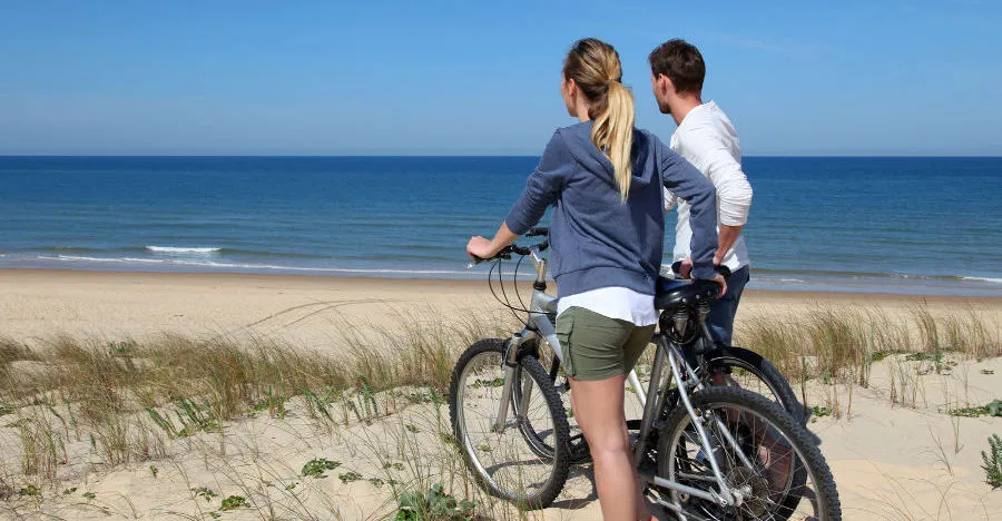 Lake Michigan Couple Biking - View of the Lake