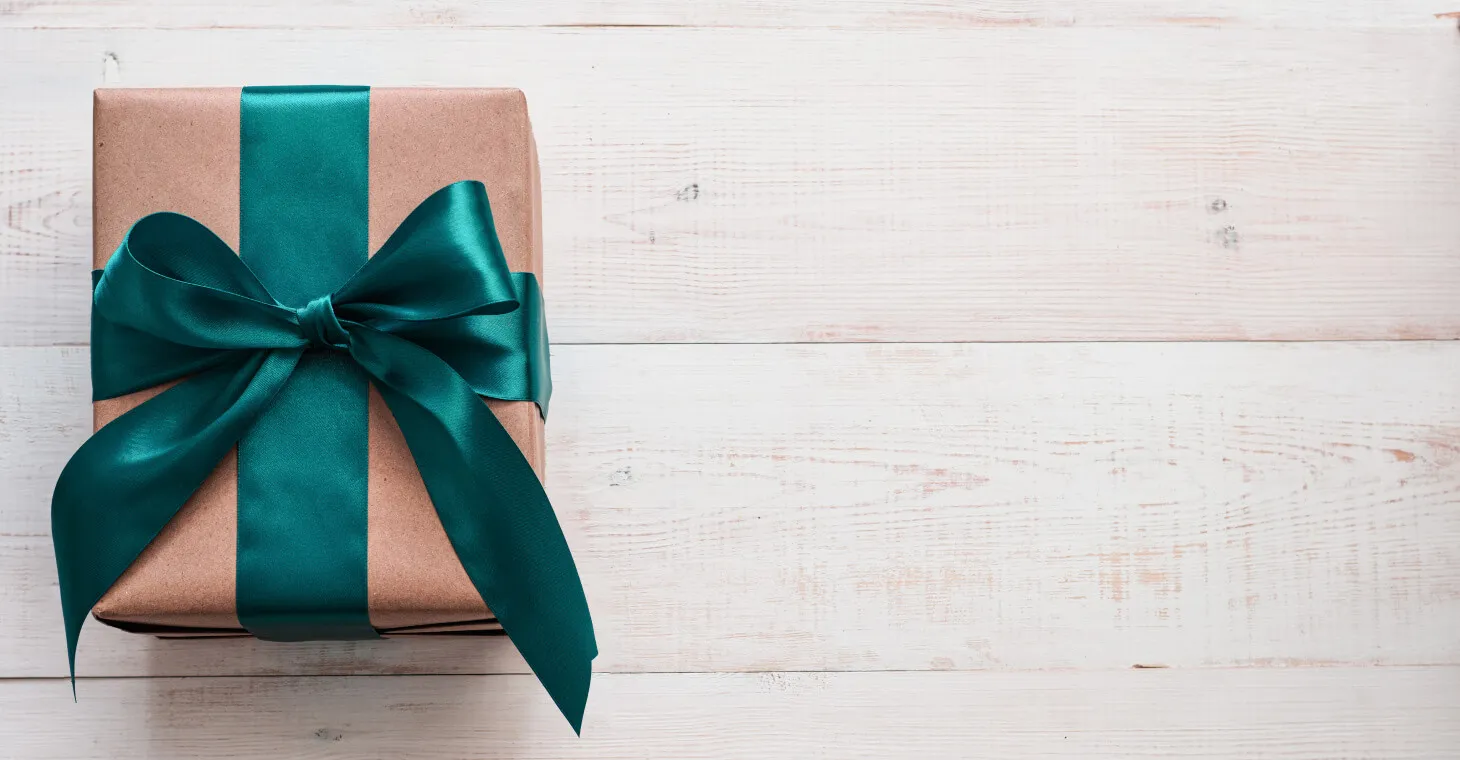 Brown gift box with green ribbon