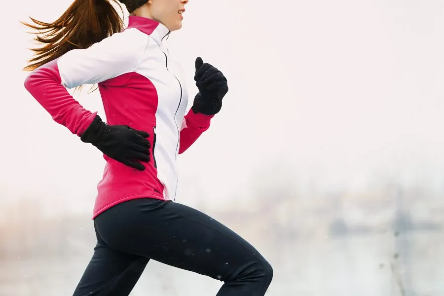 woman running on a Wisconsin Christmas getaway