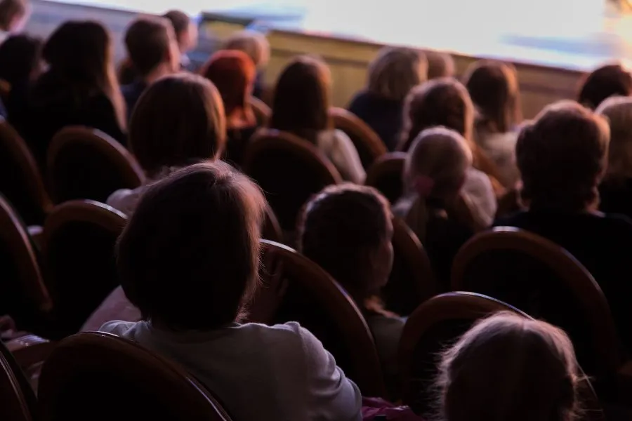 people watching a film during a Wisconsin Christmas getaway