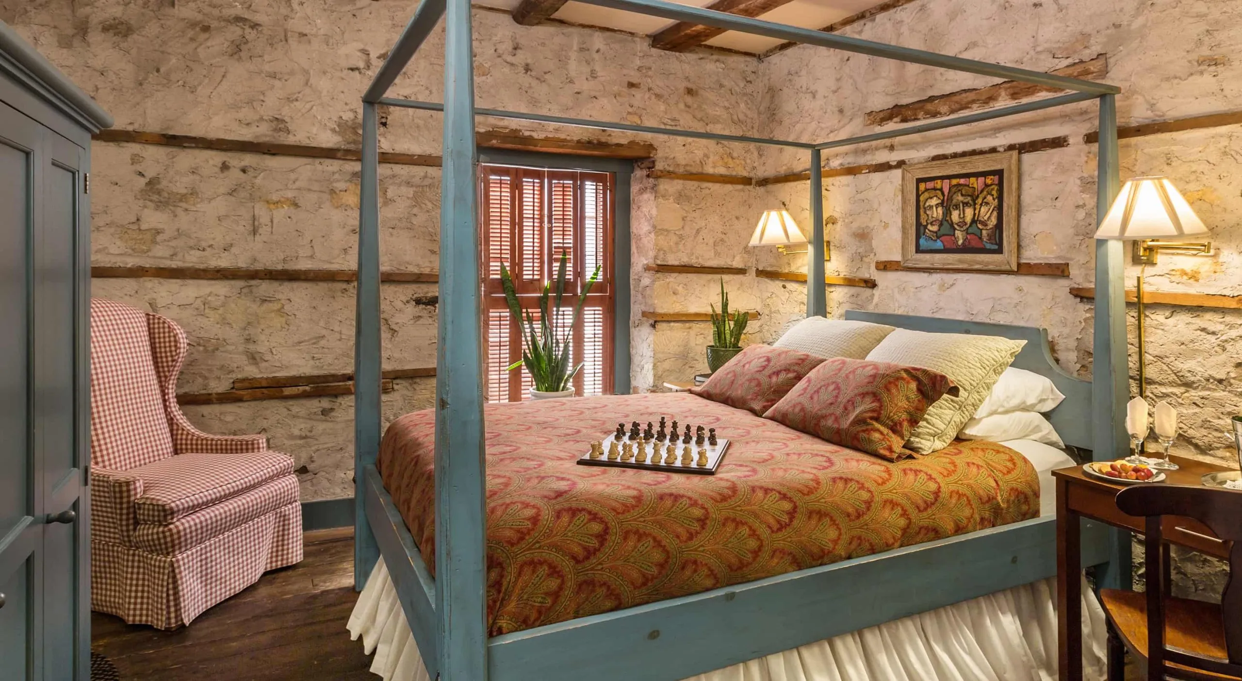 Comfortable room at Washington House Inn with a chessboard on the bed