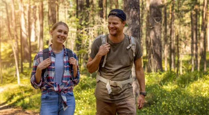 a couple hiking together on a romantic getaway near Chicago