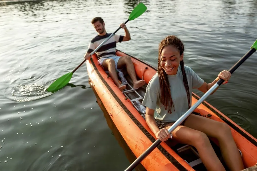 a couple kayaking together on a romantic getaway near Chicago