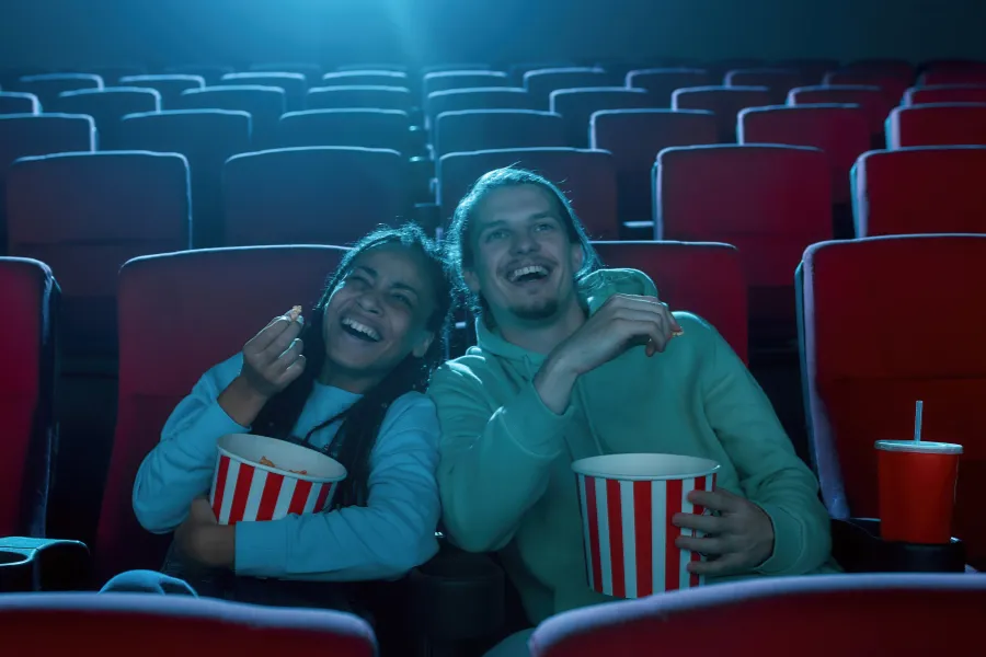 couple enjoying a movie at Rivoli Theatre in Cedarburg