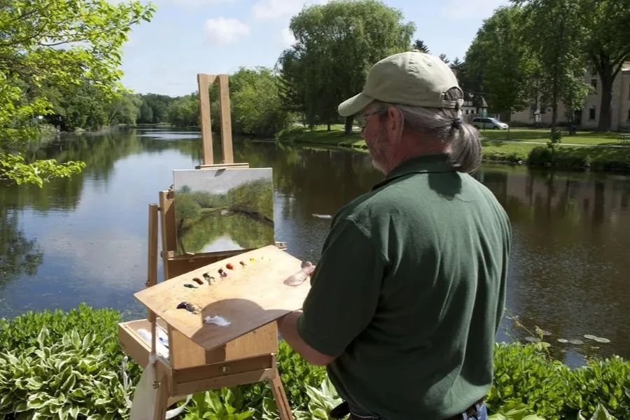a man painting at the Plein Air festival in Cedarburg