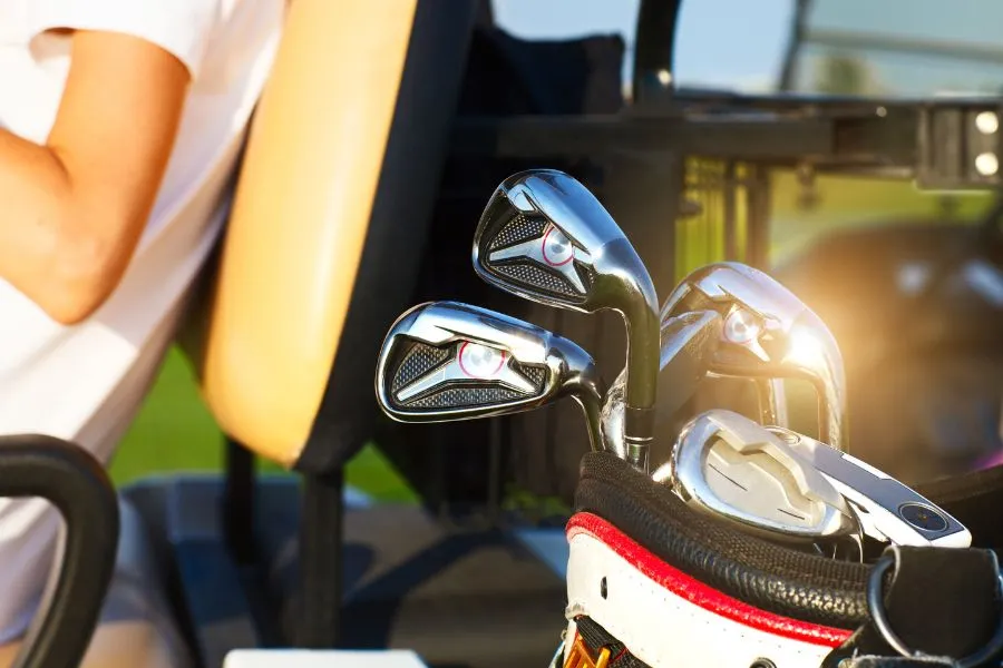 golf clubs on a golf cart