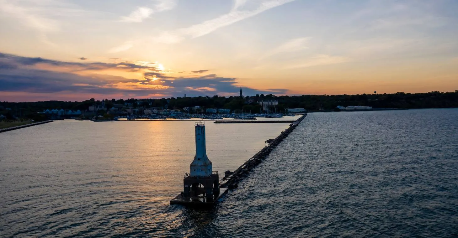 Lighthouse w Blue Sky and Water
