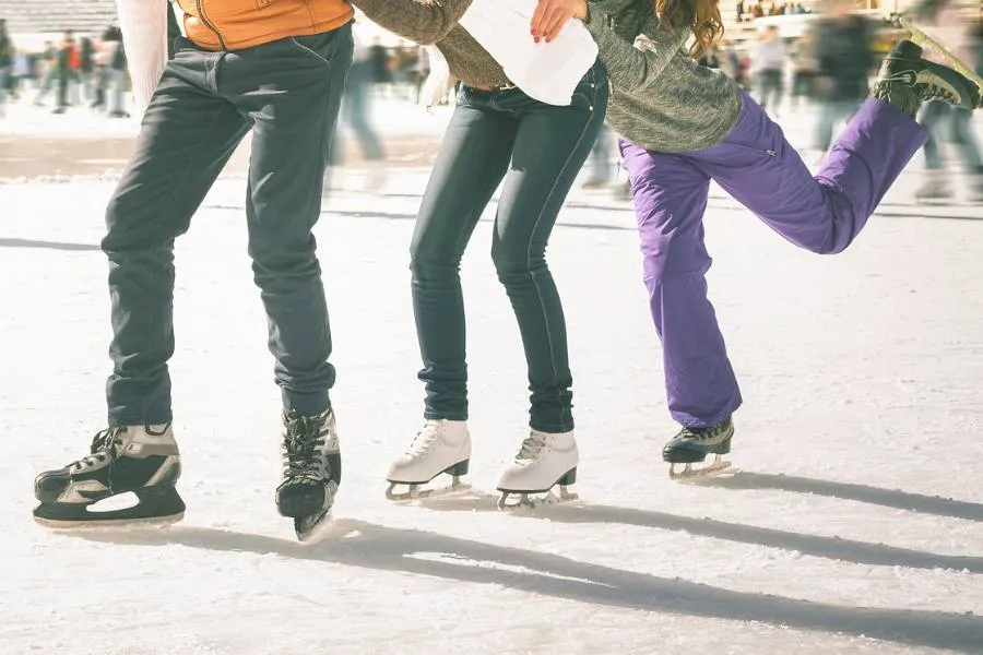Group of friends ice skating