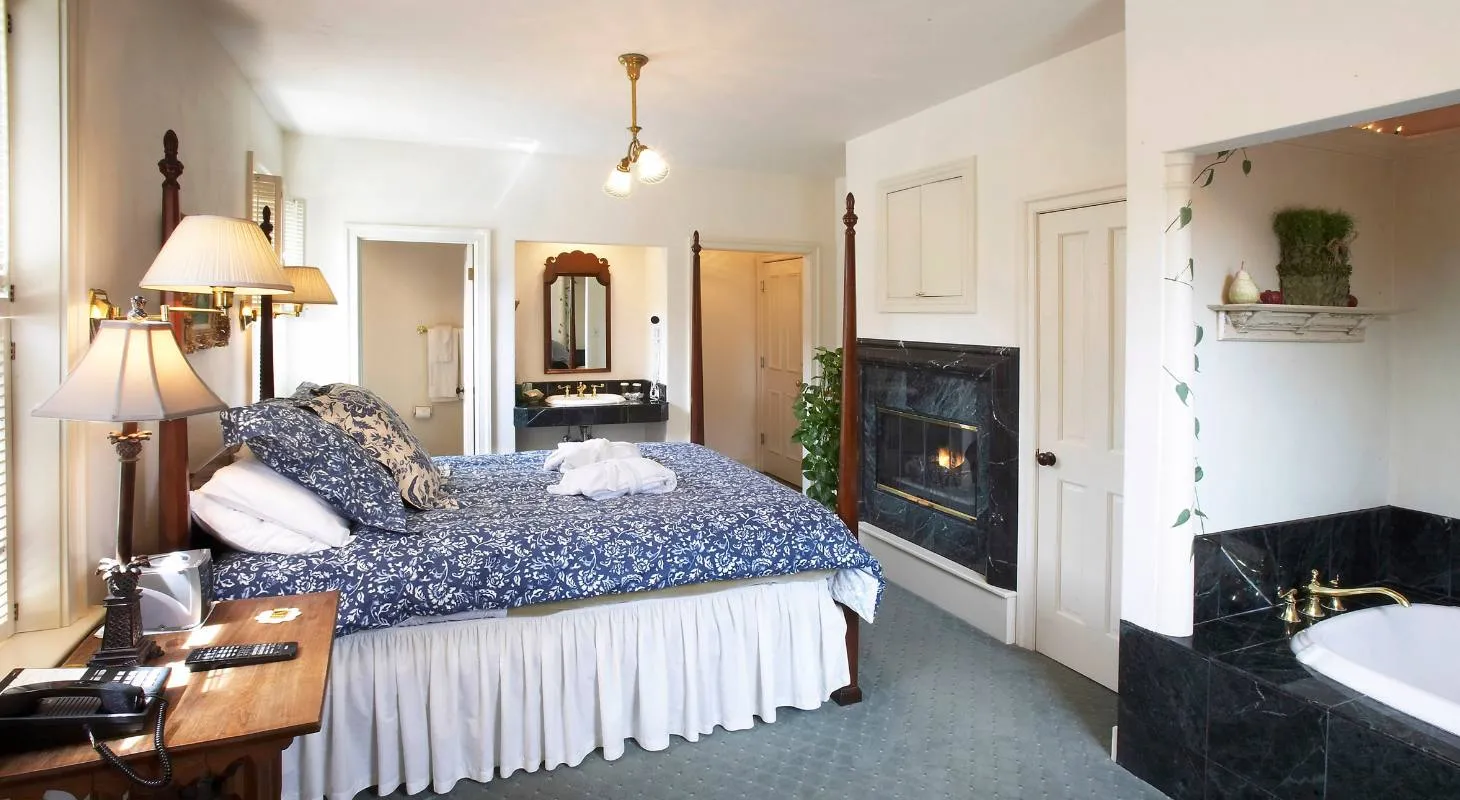 Cozy room at Washington House Inn with fireplace and bathtub
