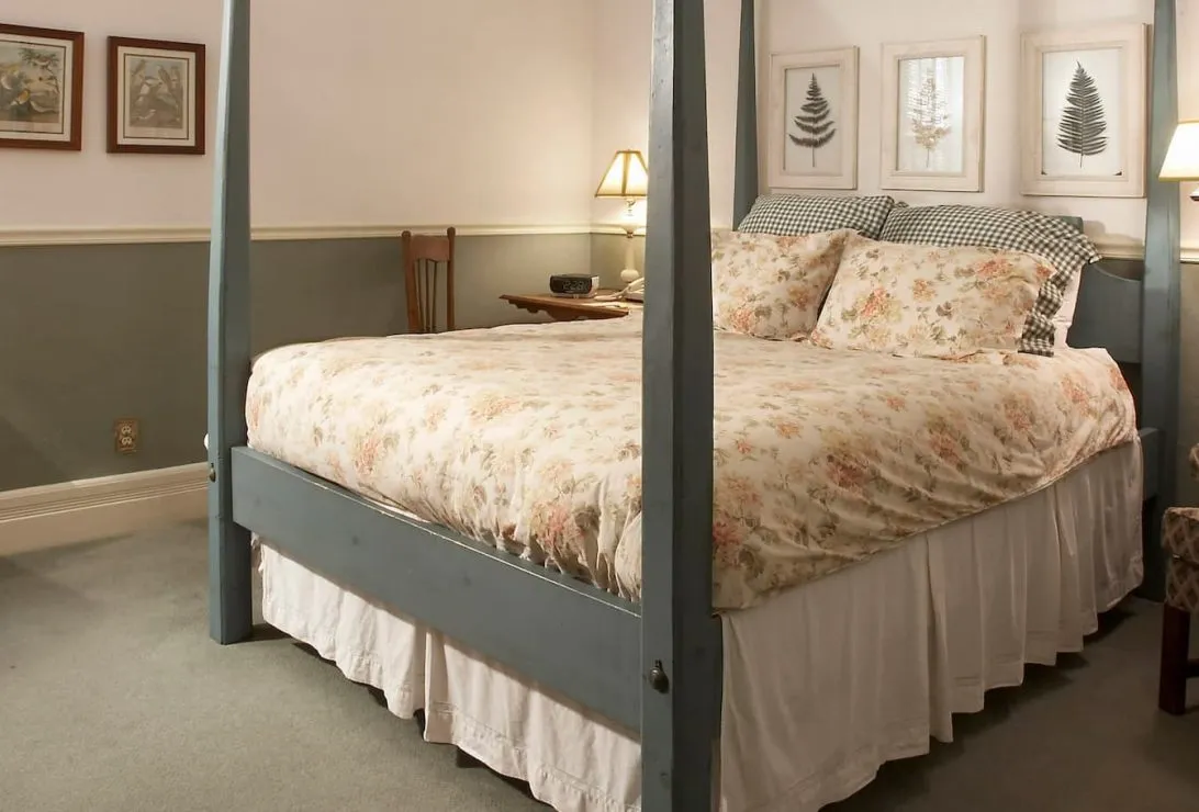 king guest room at Cedarburg inn with two large chairs