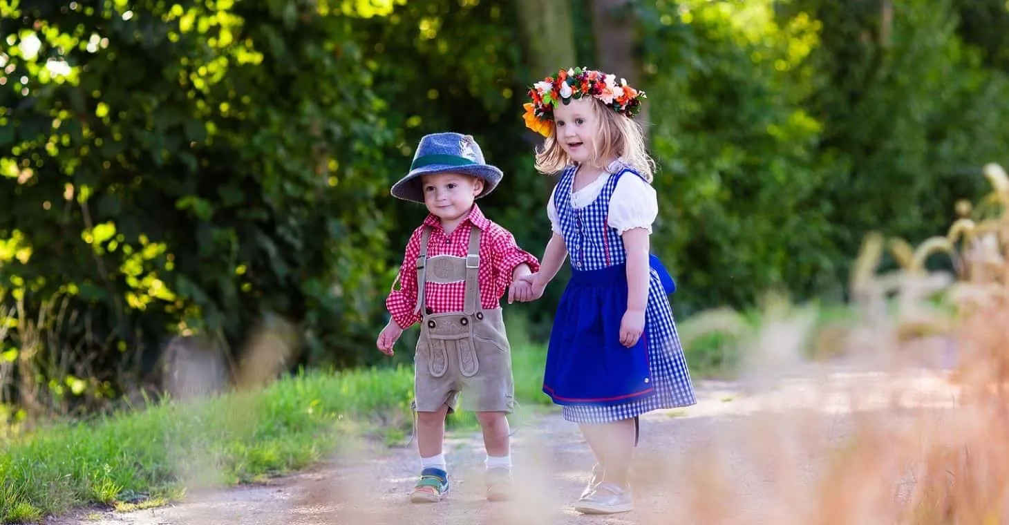 Children in traditional Bavarian attire celebrating at Cedarburg Oktoberfest
