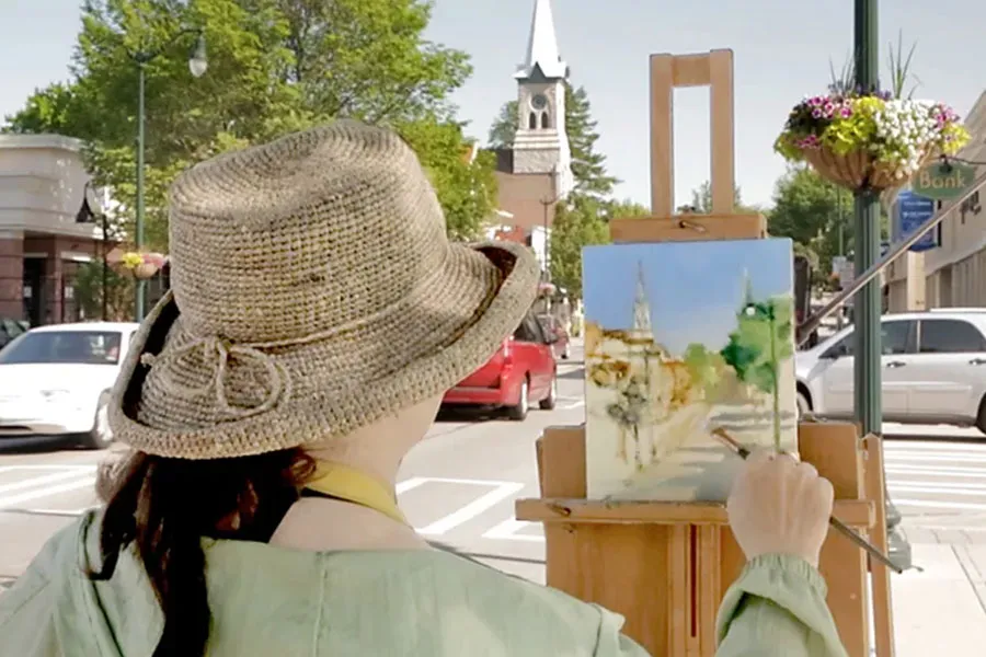 Woman painting at the Cedarburg, WI Plein Arts Festival