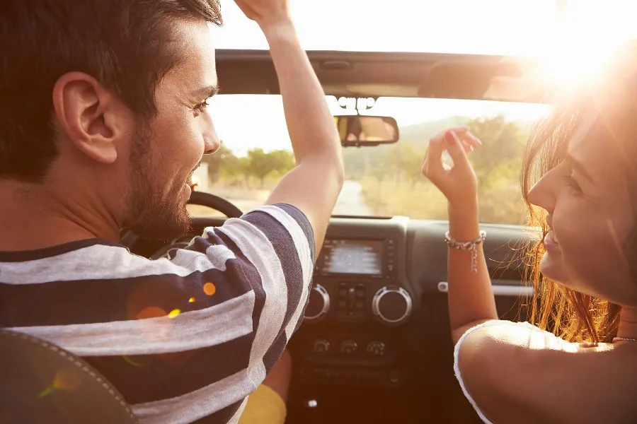 couple in jeep on road trip